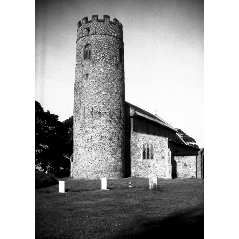 in 1977 --  "Near North Walsham. Round tower probably pre-conquest."