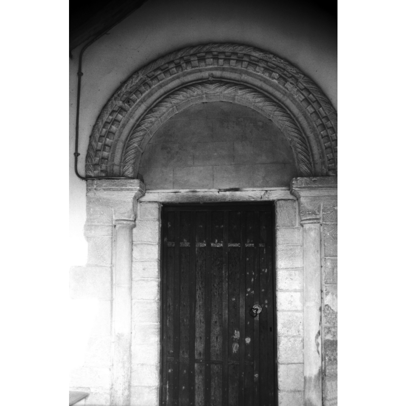 the fine Norman portal has survived; not so the tympanum