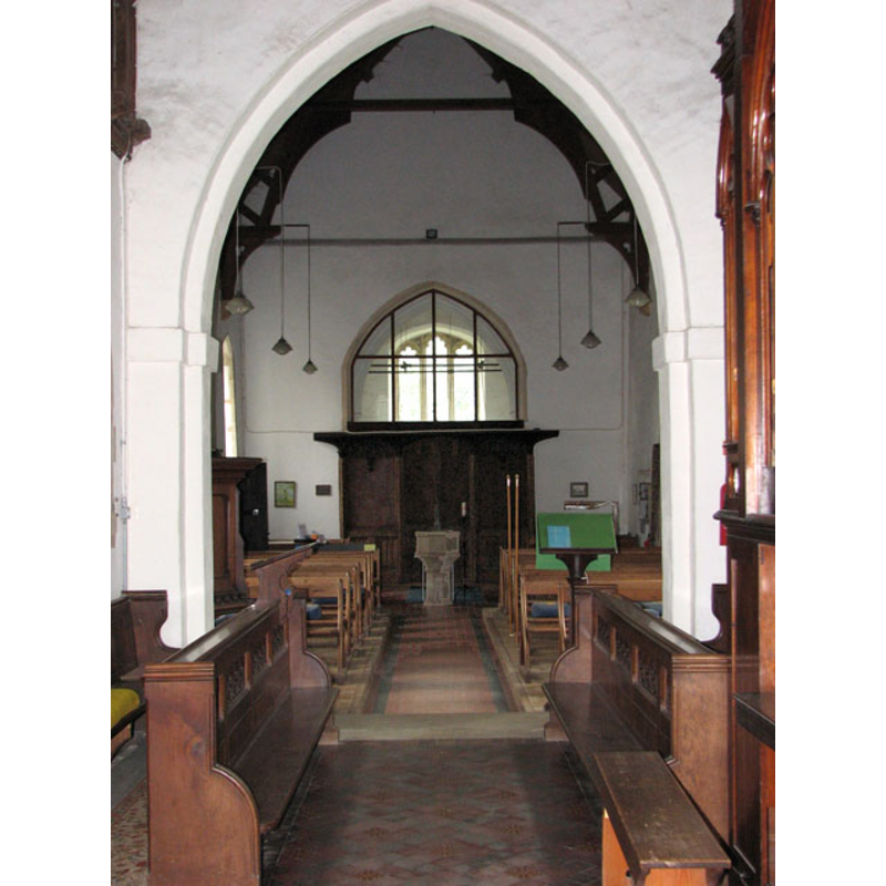the font is visible at the back (west), by the tower arch