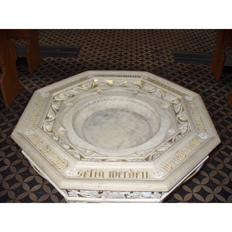 the modern basin showing the carved inscription [cf. FontNotes]