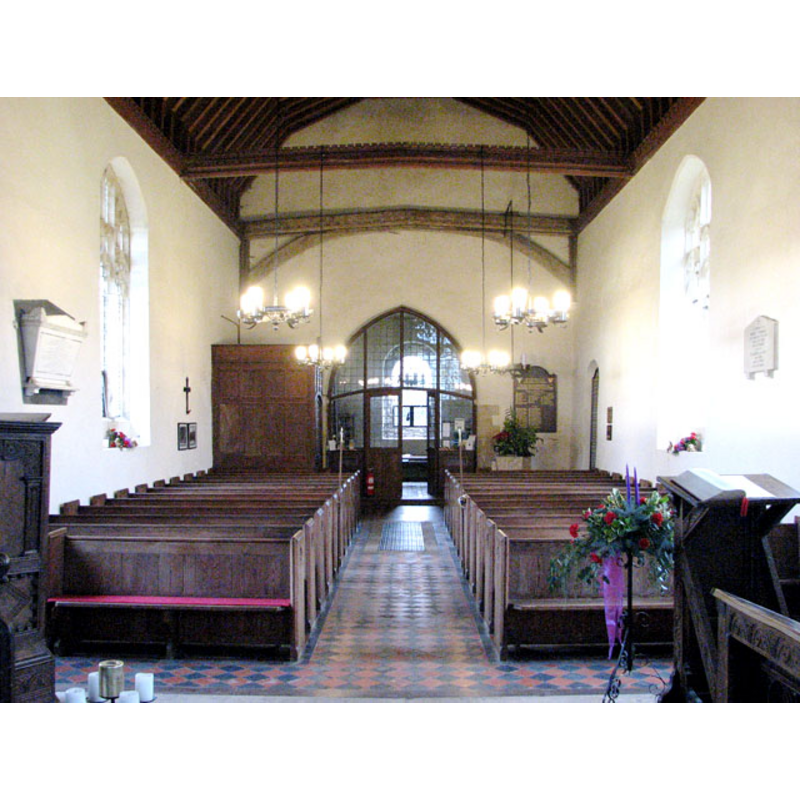 the font is partially visible at the far end (west), behing the bank of benches on the right (north) side