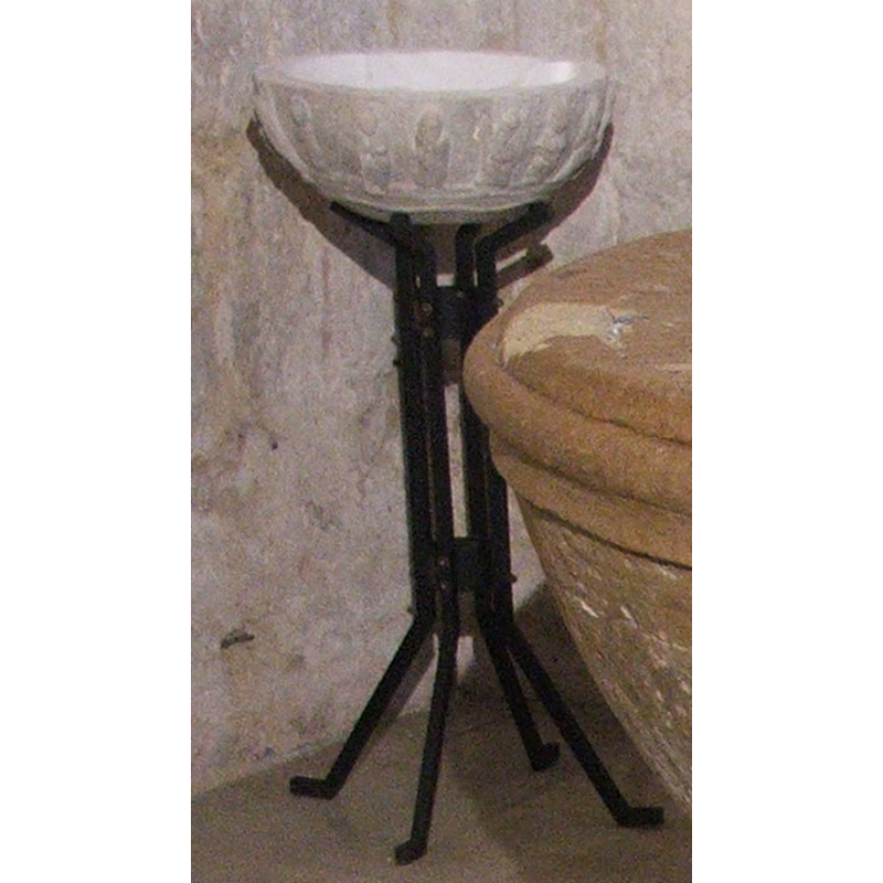 no information available on this item at present; appears to be the basin of a holy-water stoup, newly mounted; figures around the basin sides and underbowl