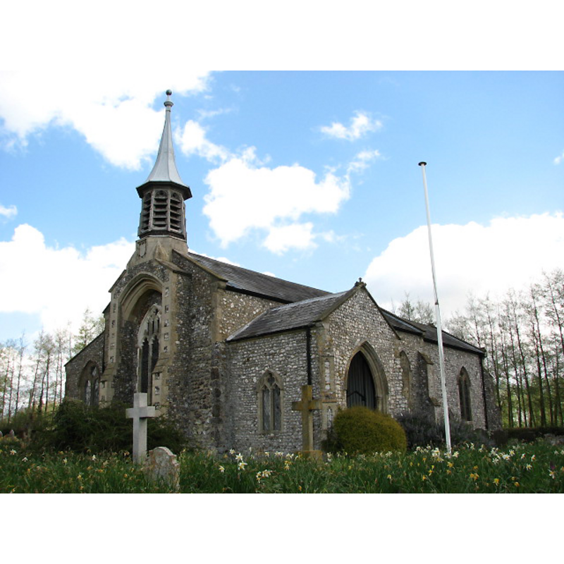 The modern belfry replaced the original tower which had collapsed in the 18th century