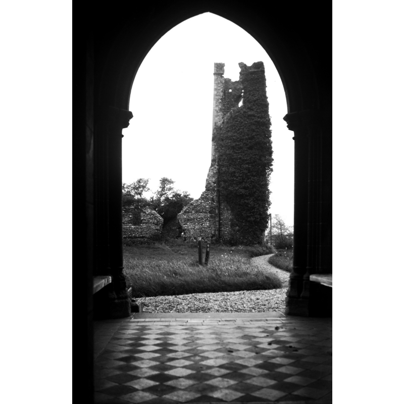 St. Margaret's ruins, seen through the portal of St. Mary's, in 1950 -- The two churches were that close!
