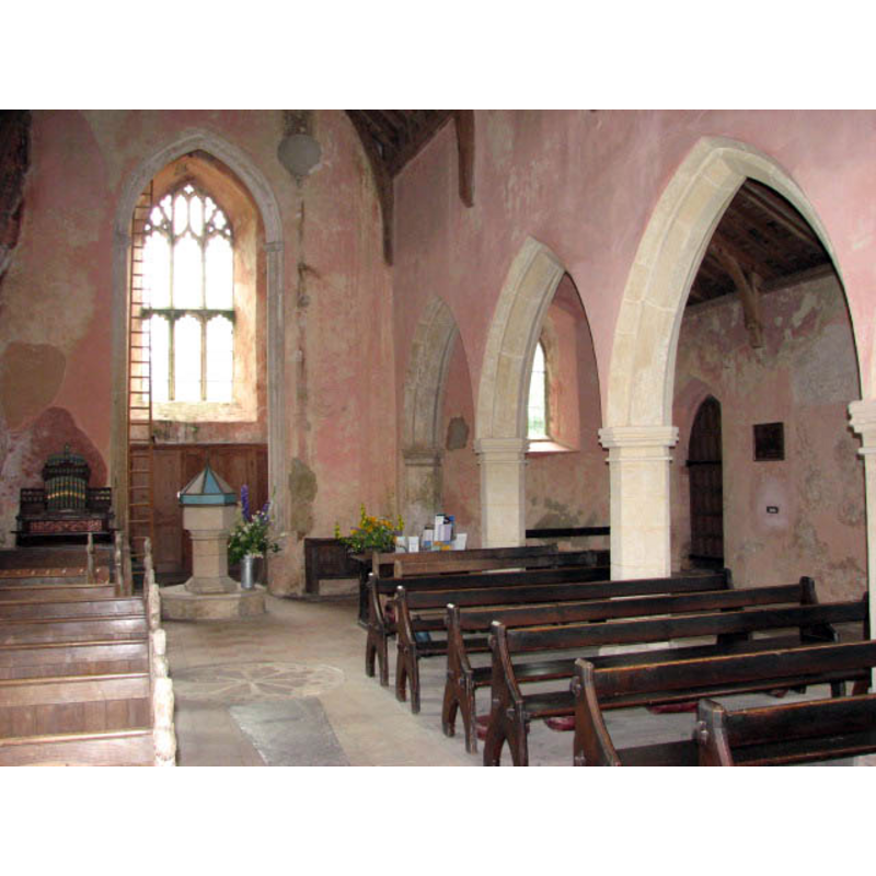 the modern font visible at the west end; on the right, the north aisle