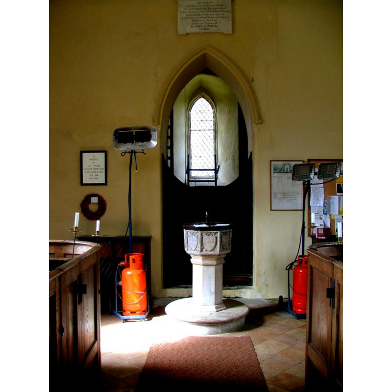 the font just east of the tower entranceway