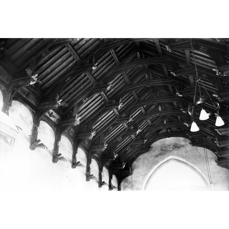 Photo caption "Nave roof covers a span of 30 feet 6 inches. Given by John Smithe in 1503. Arch-braced between wall posts, it has three tiers of angels"