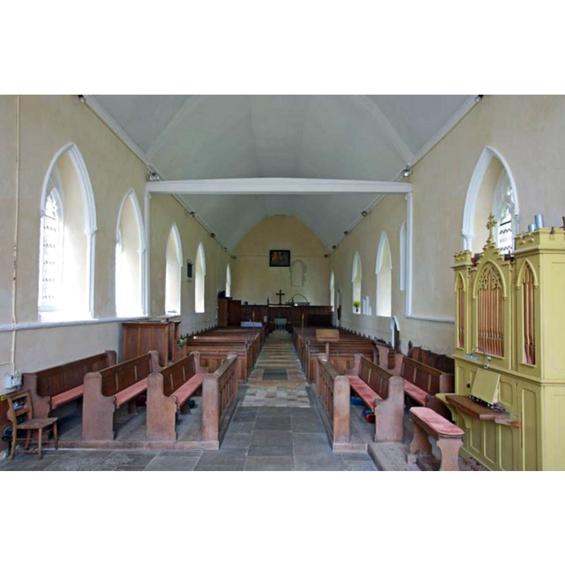 the font is located at the west end, by the tower entranceway