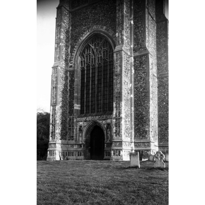 Photo caption: "Fine west window and doorway in 15c tower"