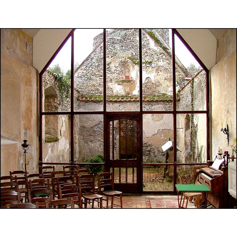 the west end of the nave and the tower are in ruins; the east end of the nave and the chancel were restored and are now in use [it is a private chapel]