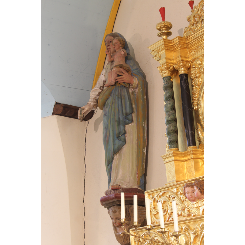 to the left of the main retable