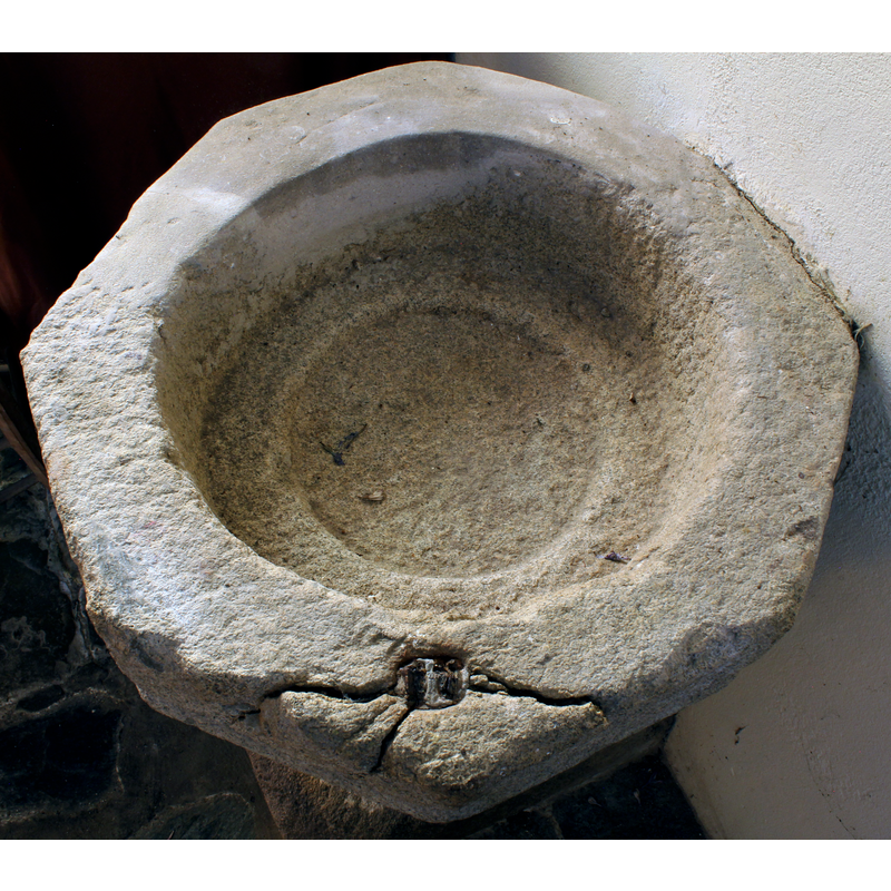 notice the damage in the upper rim area at the front, and the reconstruction in cement at the back