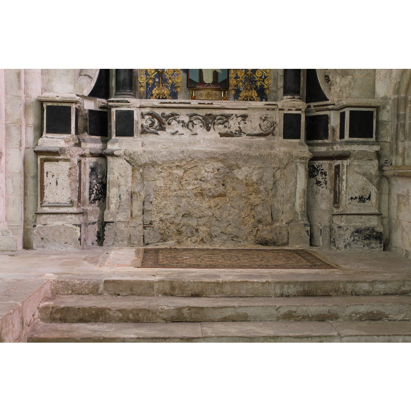 showing the un-restored state of the altar frontal