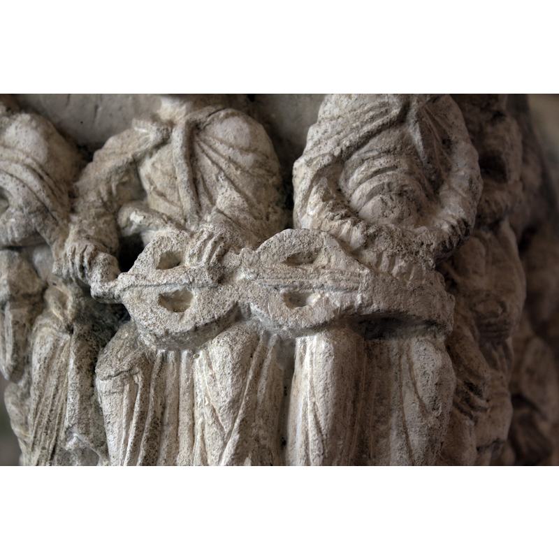 musicians`capital formerly from the abbey cloister [the original is in a museum in Rouen -- this faithful copy is located in the chapter room of the old abbey]