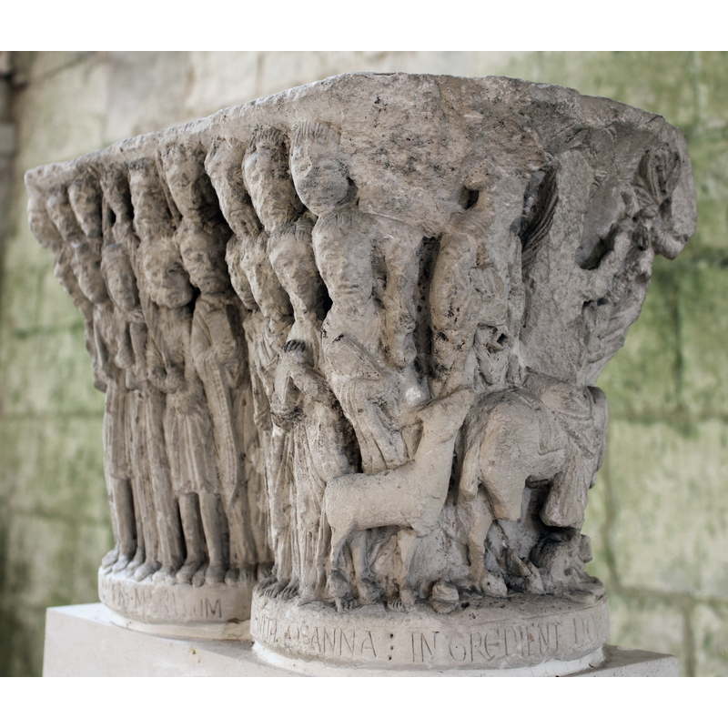 late-12th century capital from the original cloister here -- scenes from Christ's triumphal entry into Jersusalem, accompanied by St. Peter and the four Evangelists