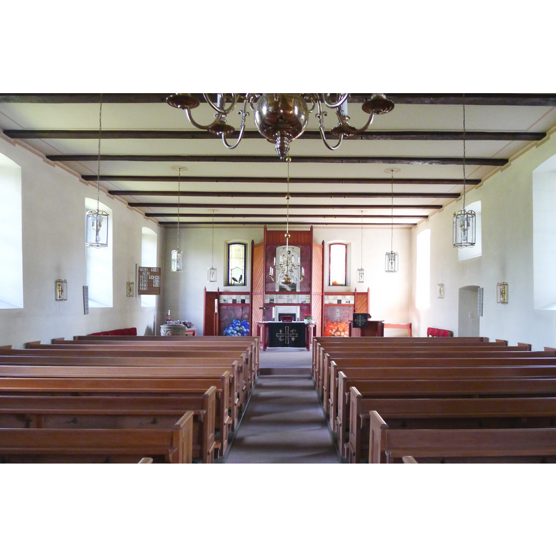 the top of the font is visible in the northeast corner, to the left of the altar