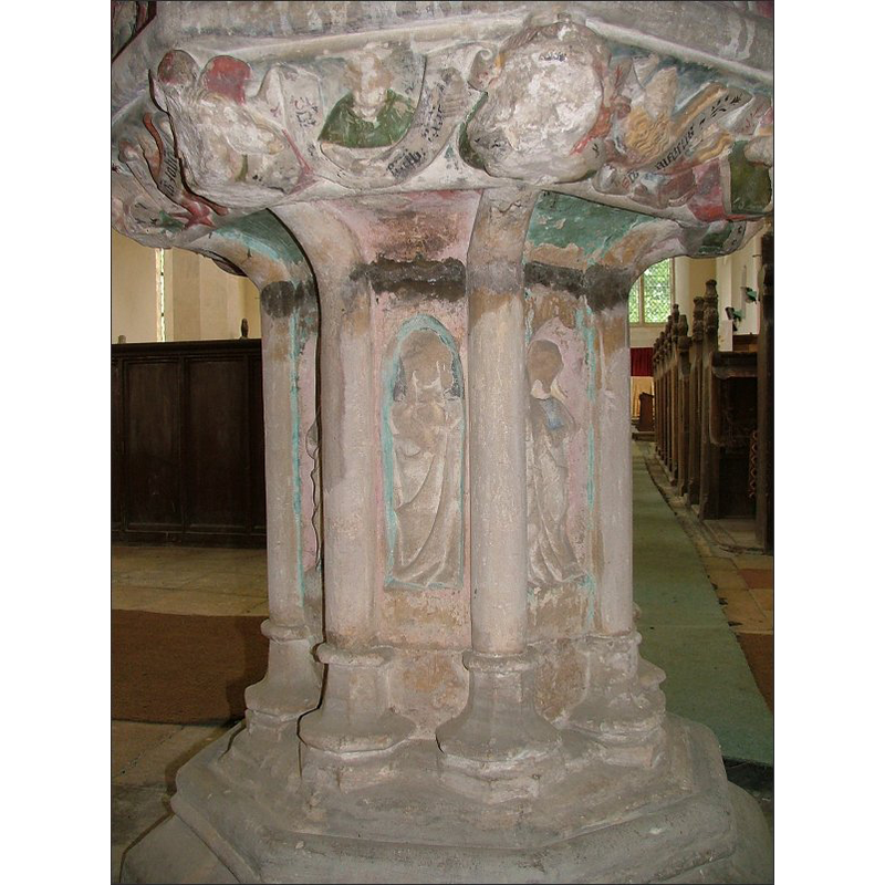 on the sides of the pedestal base -- unidentified