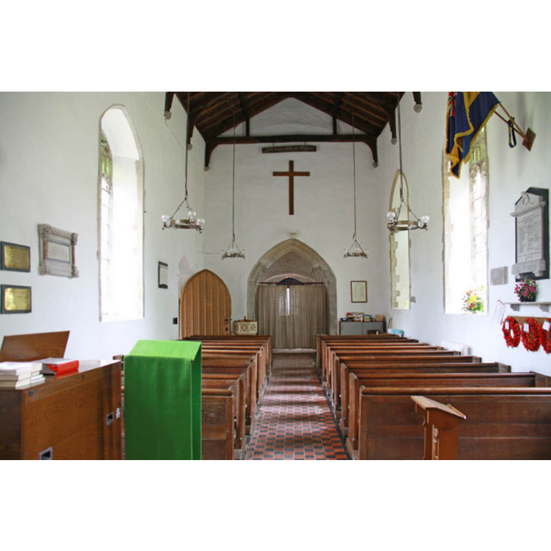 the top of the modern font is visible by the open south door