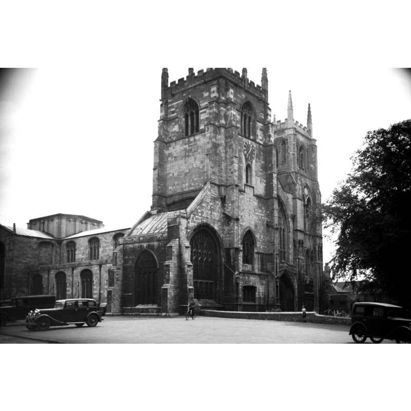 Photo caption: "Founded by Bishop Herbert de Losinga in 1100. Practically reconstructed in 13c"