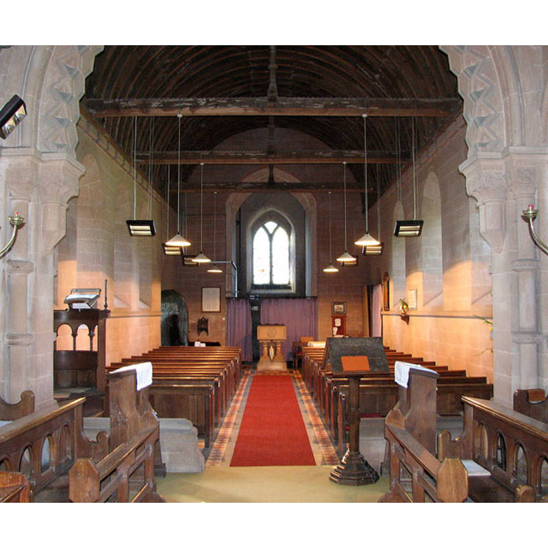 the modern font at the west end of the nave
