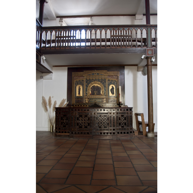 the modern font of 1902 in the context of the west end of the nave and the gallery above it