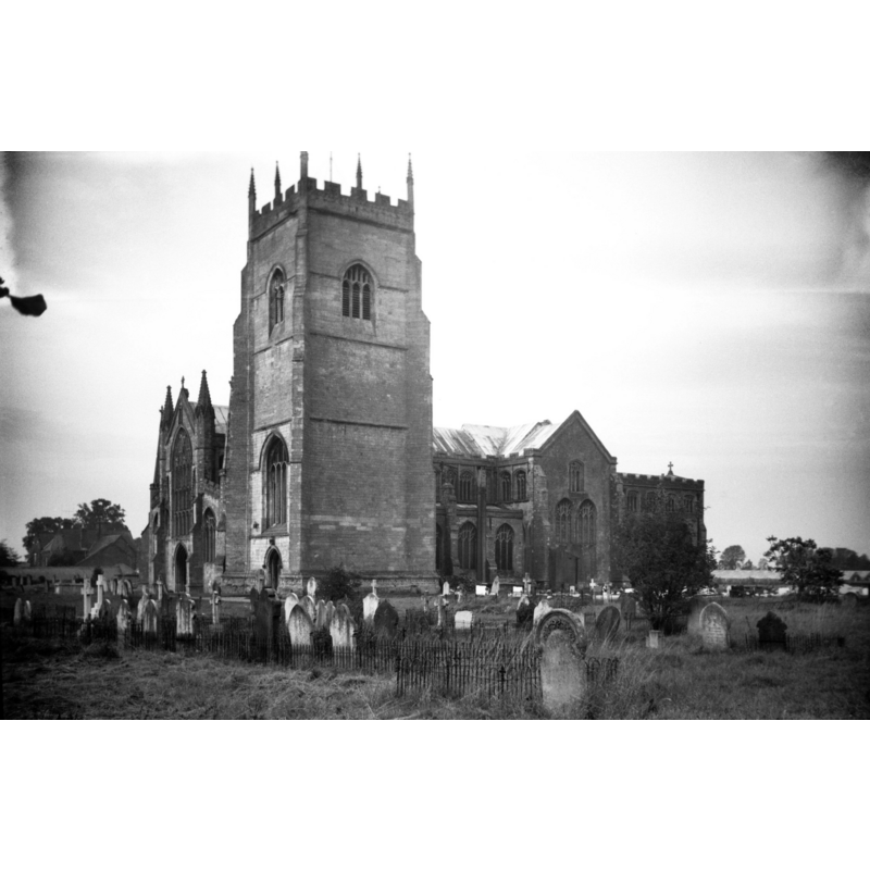 Photo caption The 15c tower stands detached about 8 feet at the north-west corner"