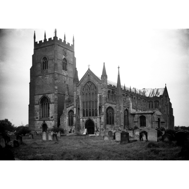 Photo caption: "Practically the whole church was rebuilt during the Perpendicular period, commencing 1380"