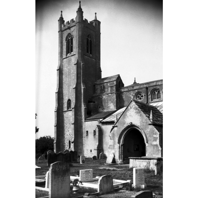 Photo caption: "The 15c tower originally free-standing but later linked to the church by a construction known as the Priest's House"