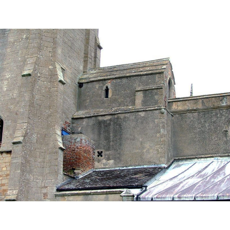 the tower and the church were originally separated; the odd construcion here fills the gap now