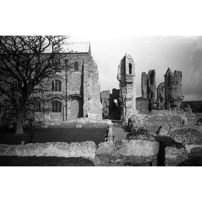 the southeast end of the nave of the church and north view of the priory garth