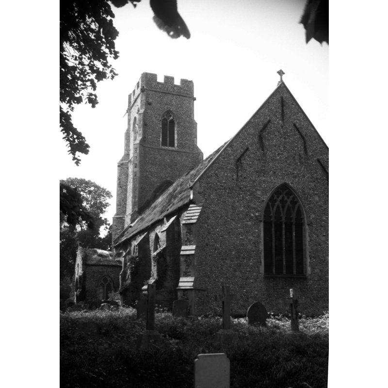 Photo caption: "Early 14c nave. The chancel cut short and rebuilt in 1827"