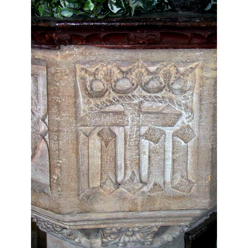 a re-carved emblem not inscribed in a shield
