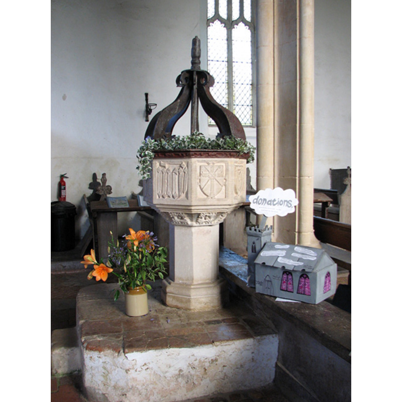 at the west end -- note the old encaustic tiles on the plinth