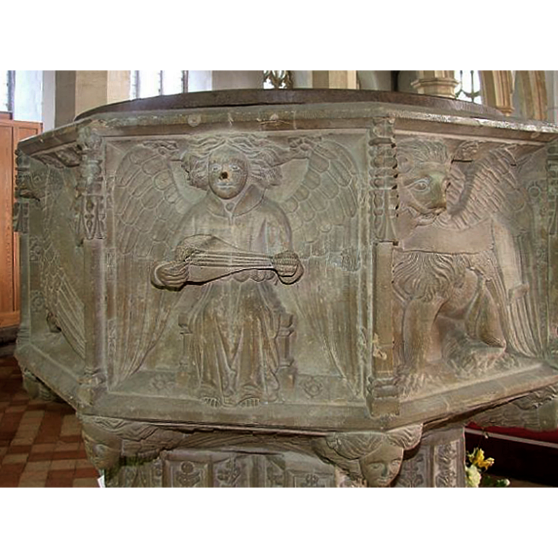 one of the four musical angels between John's eagle on the left [northwest] and Mark's lion on the right [southwest] [orientation is approximate]