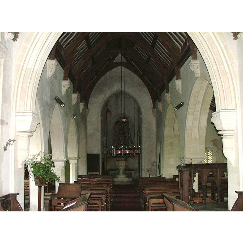 the modern font is visible at the west end, beneath the tower