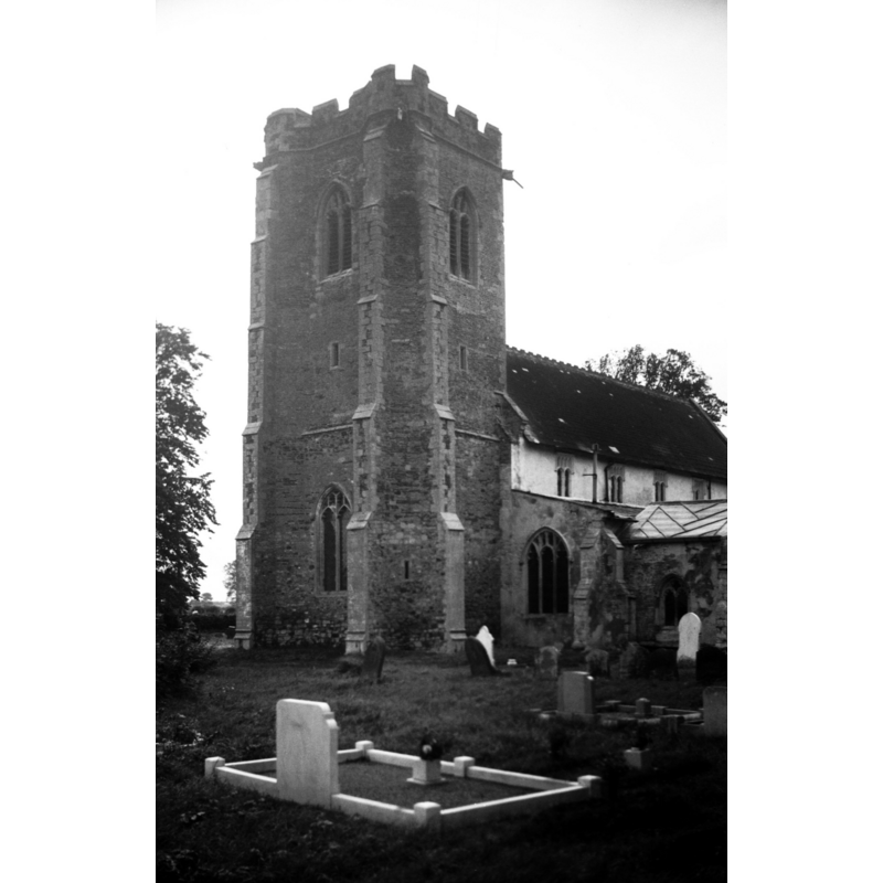 Photo caption: "The tower, showing stair-turret between south and west buttresses"