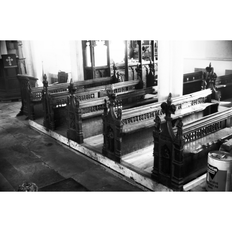 Photo caption: "South side of nave, showing pierced and traceried backs. Ranking with the best in the Kingdom"