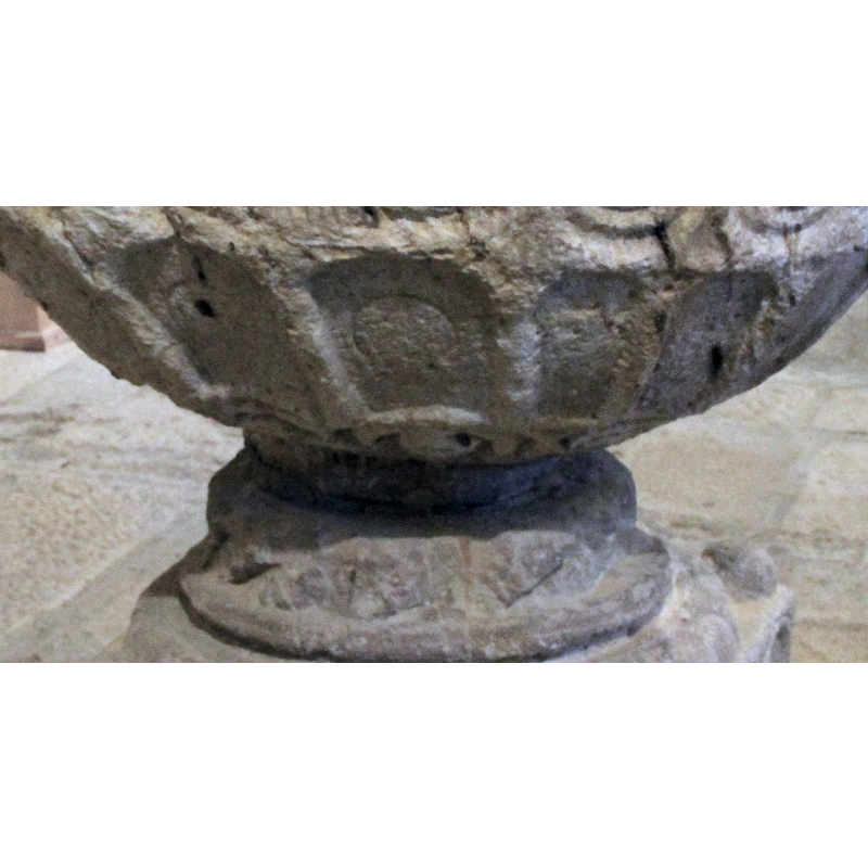 very irregular; some of the arches may have some motif in them