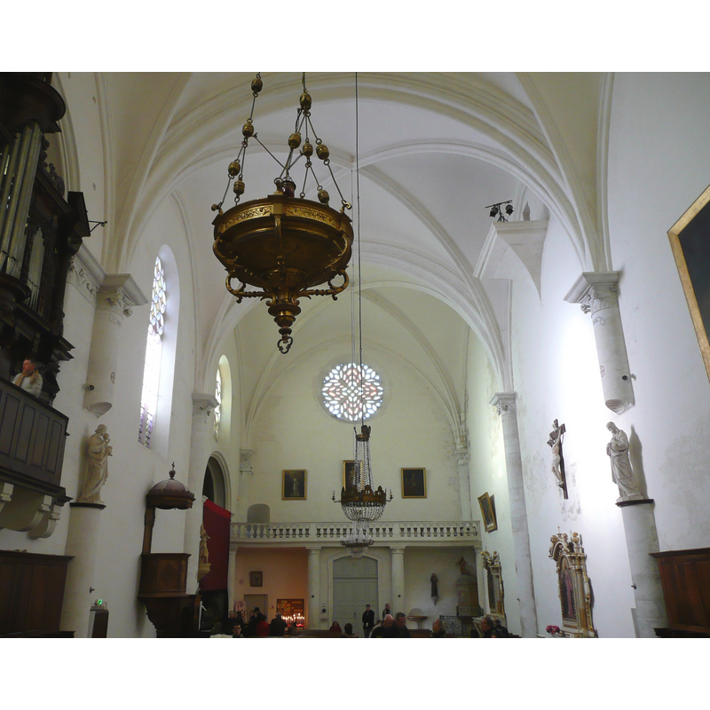 the font and canopy are located in the northwest corner of the nave, beneath the gallery