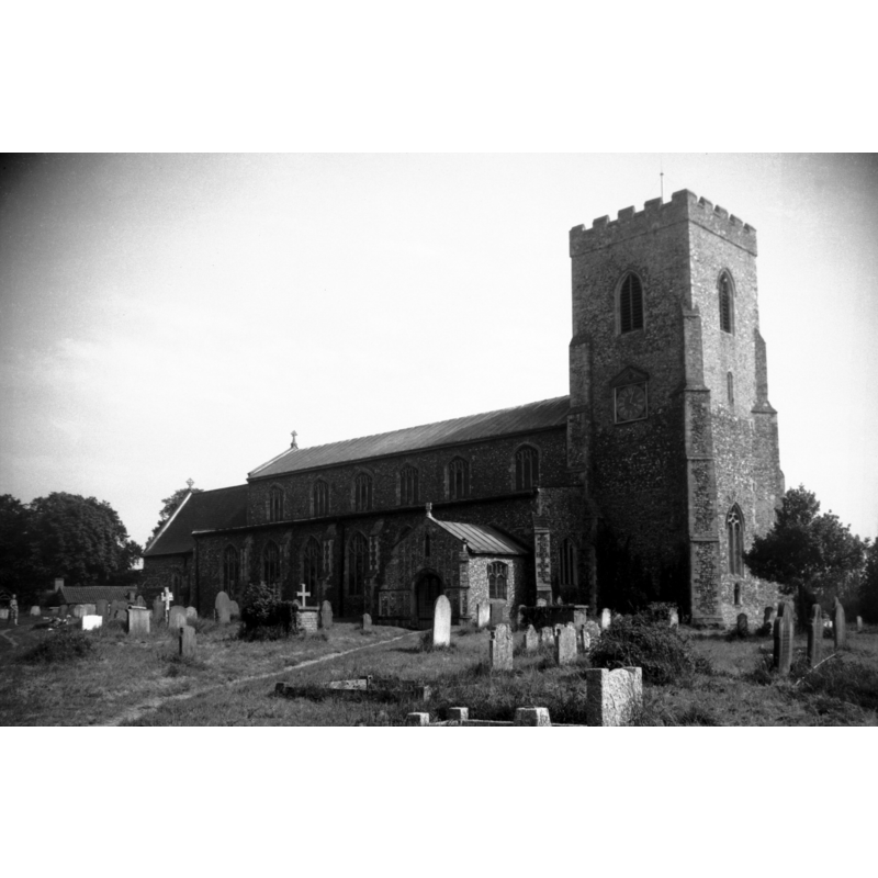 Photo caption: "14c tower, 15c porches"