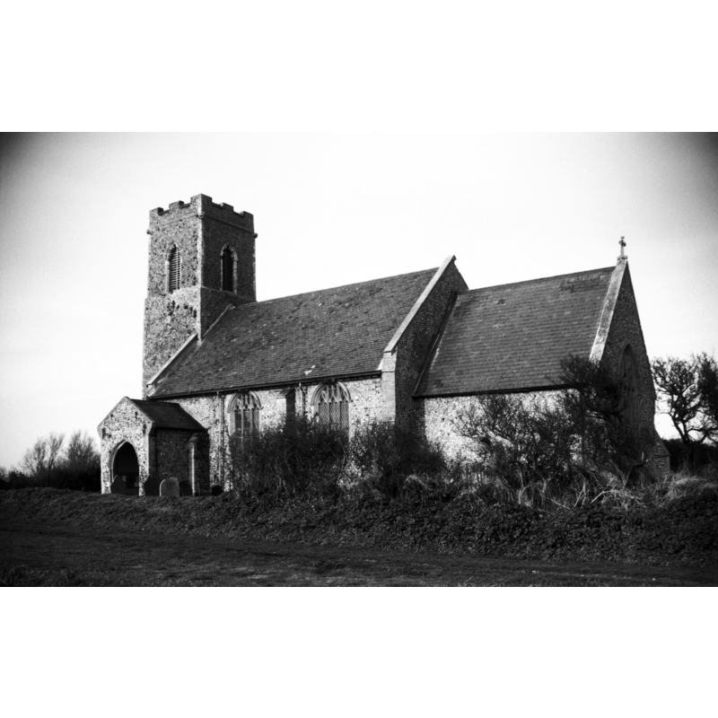 Photo caption: "Mainly 14c. 'The tops of the nave windows have been cut off by lowering the pitch of the roof.'"