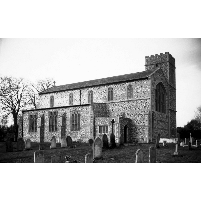 the new church has the tower attached to the north side of the east end -- Photo caption: "The rebuilt church, moved to its present site by the rector, Rev Walter Marcon, using much of the old materials. J D Sedding the architect"