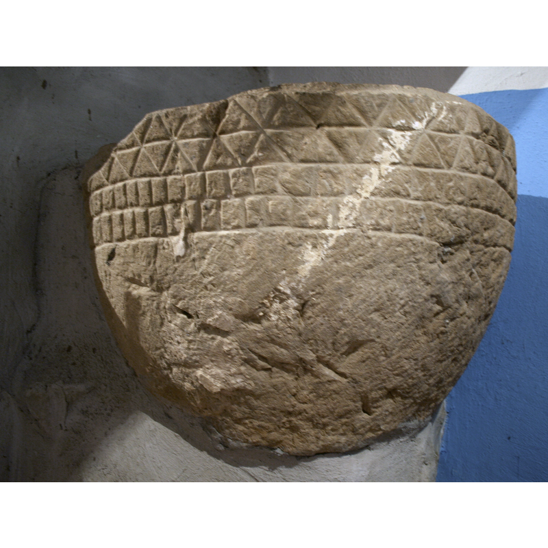 two bands, below the saw-tooth motif