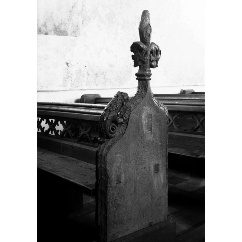 Photo caption: "One of the 15c benches showing pierced and traceried back"