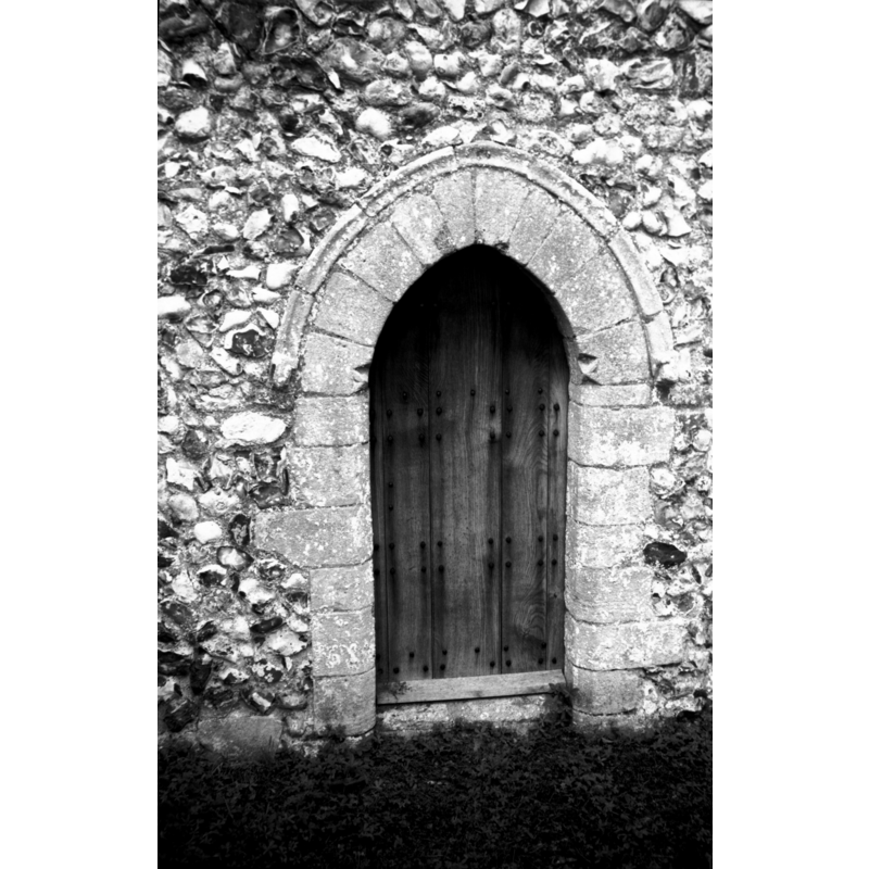 opening to the chancel -- Photo caption: "In south side of chancel. Early English with one dog-tooth at top of jambs"