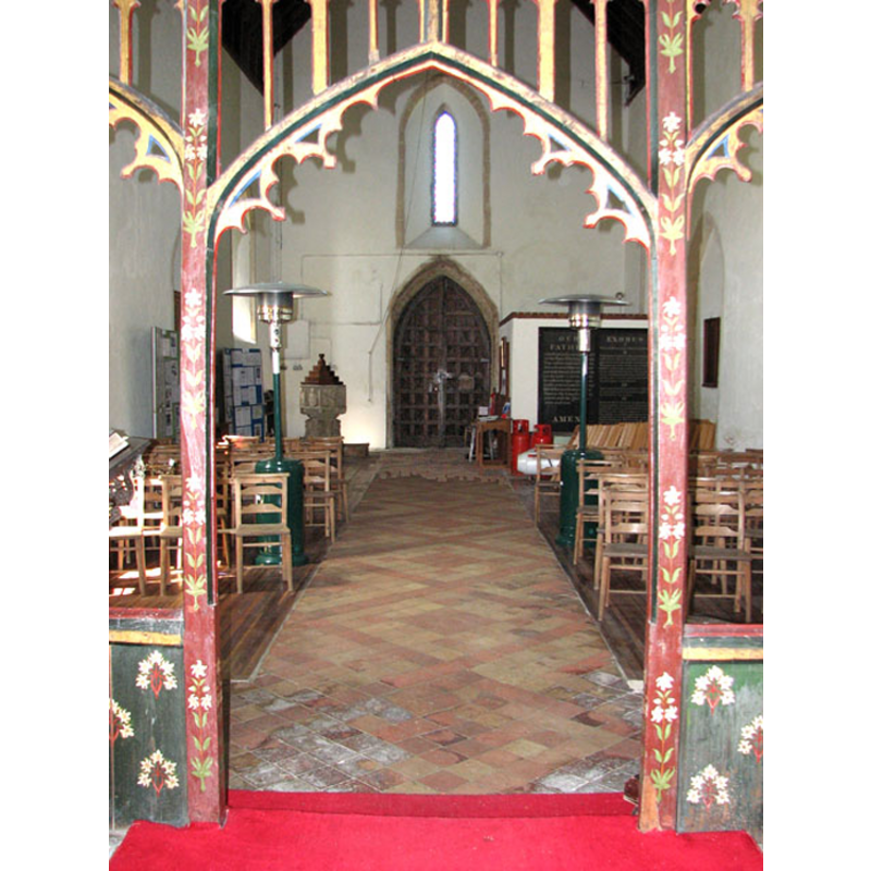 from the east side of the chancel screen; the font and cover are visible at the far [west] end, left [south] side