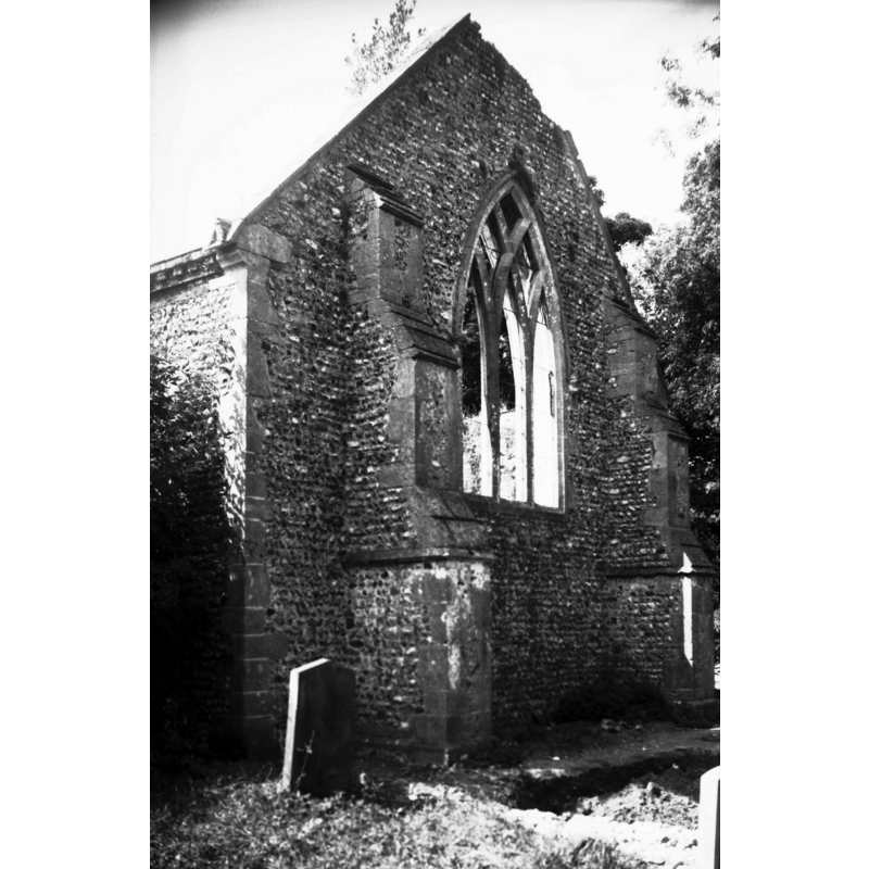 Photo caption: ""Chancel and nave in one, and south porch c1300. Original chancel demolished in 17c. Tower reduced to single storey in 18c. Abandoned 1940. Village depopulated." (The Ruined and Disused Churches of Norfolk by Neil Babcock)"