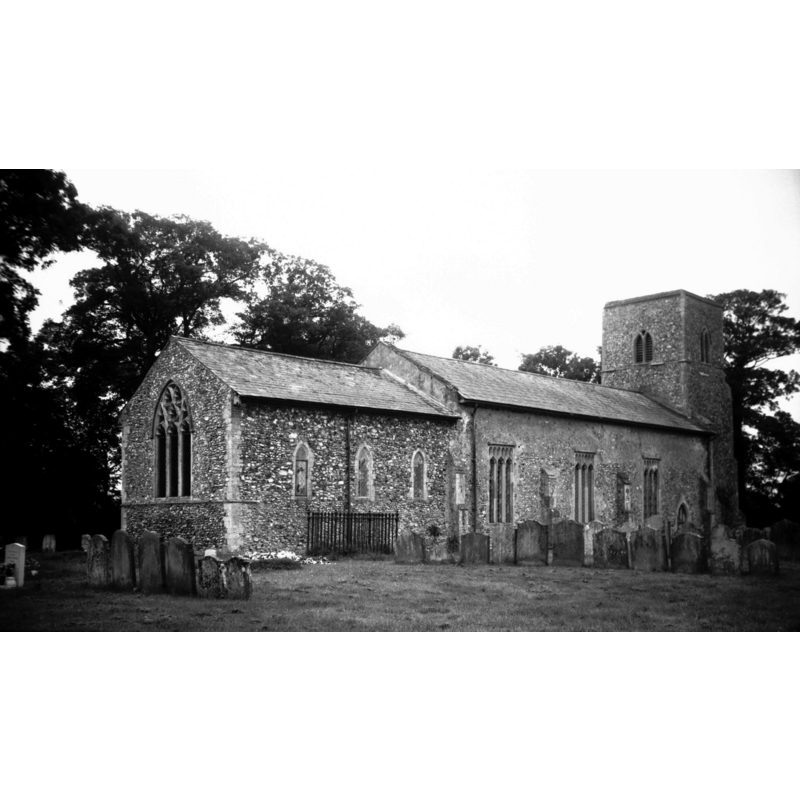 Photo caption: "The chancel is 13c, but the east window dates from 1864"