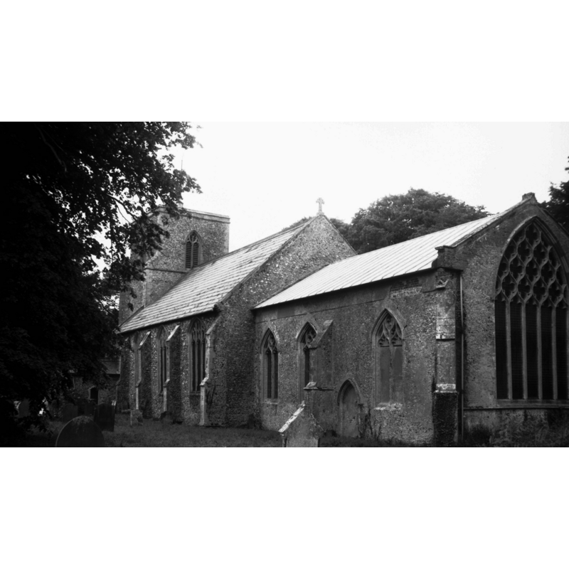 Photo caption: "The 14c east window has reticulated tracery"