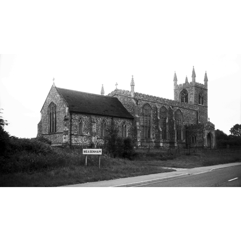 Photo caption: "Unbuttressed Early English west tower"